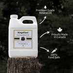 KingsFleet cutting board oil bottle on a tree stump with text highlighting features.