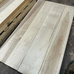 Wooden planks on a concrete floor