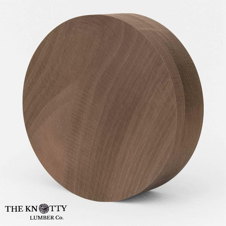 A kiln-dried Black Walnut bowl blank with a smooth surface, showing the natural grain and color variation.