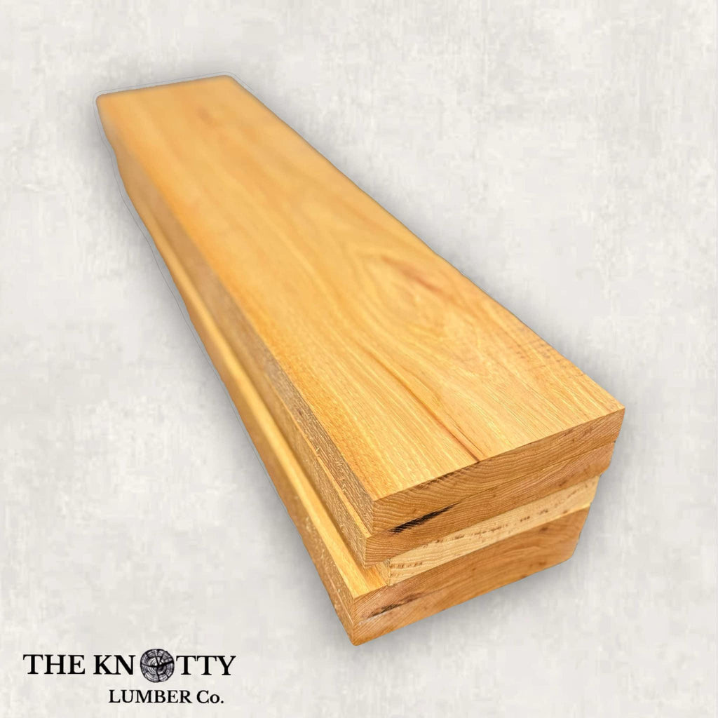 Hickory wood lumber pack, showing the wood grain and natural color, with the logo 'The Knotty Lumber Co.' visible on the bottom right corner.