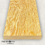 White Wenge 4/4, Otherwise known as Lati. A Wooden board with the grain and with 'The Knotty Lumber Co.' logo on a light grey background