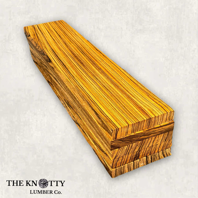 A lumber pack of Zebrawood with a distinctive grain pattern, cut into thin pieces.