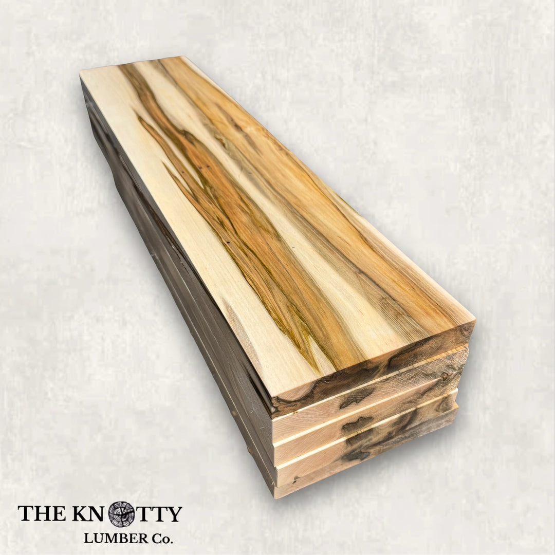 a Lumber pack of ambrosia maple wood  with natural color streaking and unique patterns.